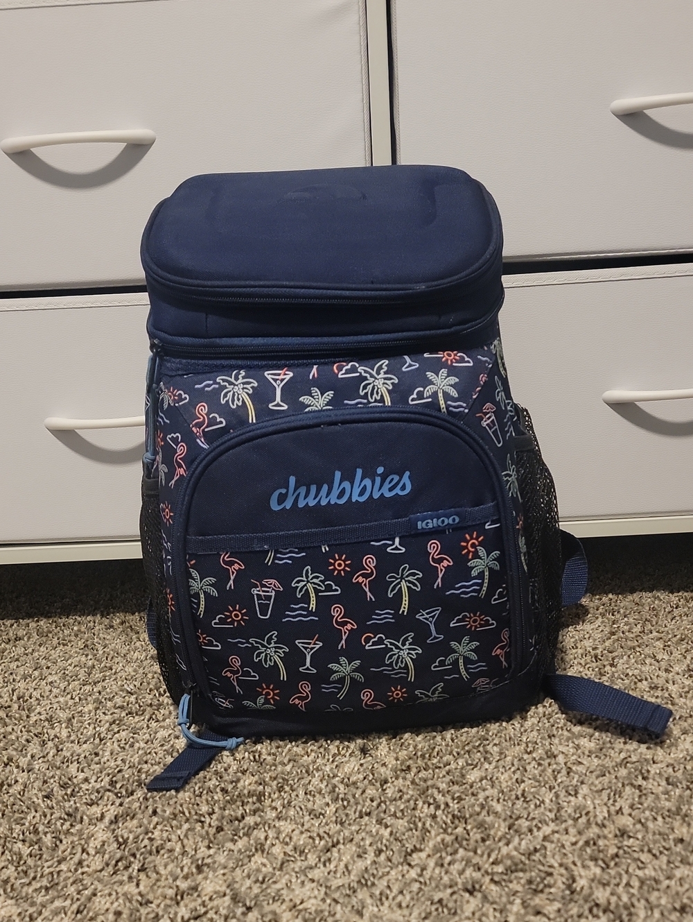 chubbies x Igloo cooler backpack featuring a playful tropical Neon Print/Navy
